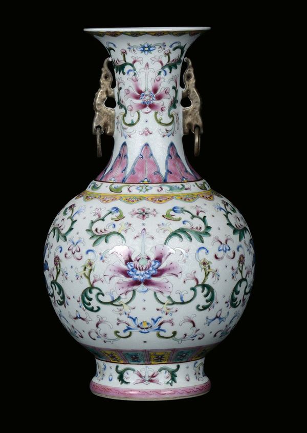 A polychrome Famille-Rose porcelain handled vase with floral decoration, China, Republic, early 20th century
