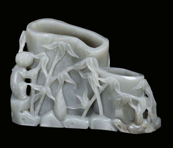 A Celadon jade brush-bowl with naturalistic motives, China, Qing Dynasty, 19th century