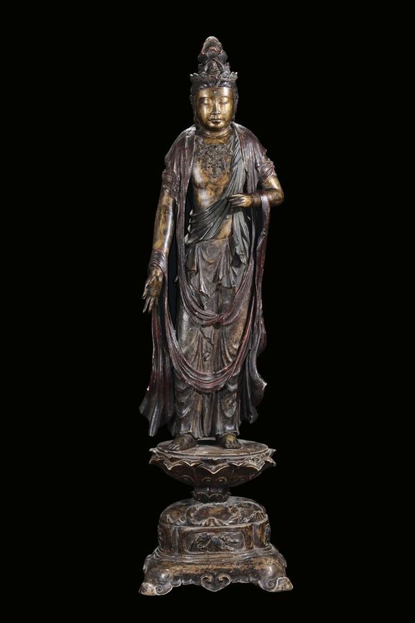 A gilt and lacquered bronze “divinity” sculpture, China, Qing Dynasty, Qianlong Period (1736-1795)