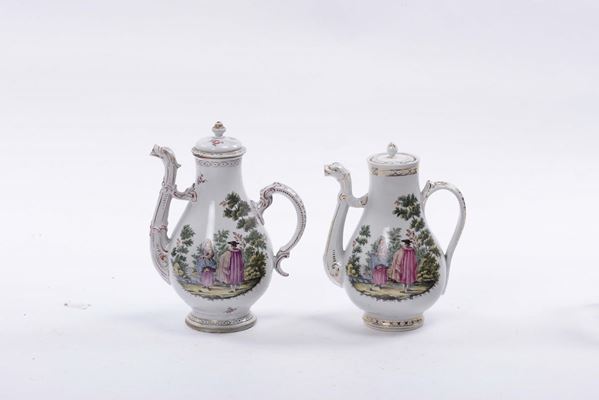 Due caffettiere in porcellana a decoro policromo, XIX secolo