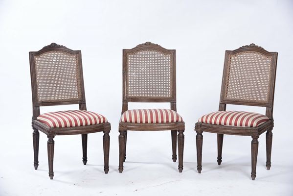 Tre sedie con seduta imbottita a righe