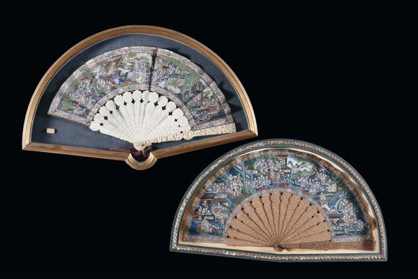 A pair of wood and ivory fans with polychrome figures, China, Qing Dynasty, 19th century