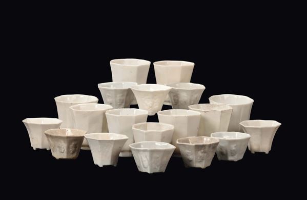 A lot of 19 Blanc de Chine porcelain libation cups, Dehua, China, late 17th century