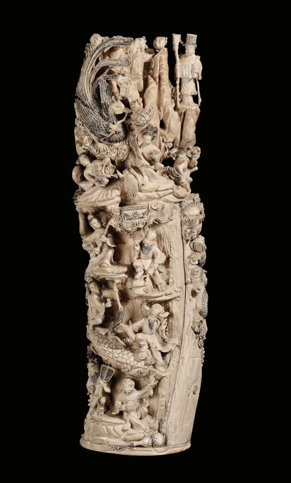 A large carved ivory “every-day life scenes” group, China, Qing Dynasty, 19th century