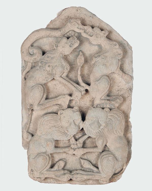 A clay relief representing an animal fight, ancient oriental art