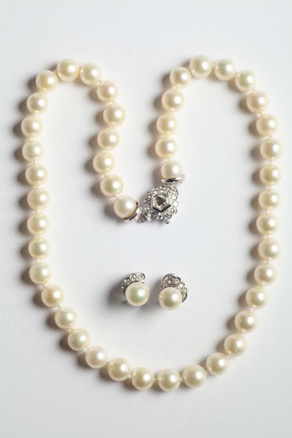 A suite of cultured pearls and diamond