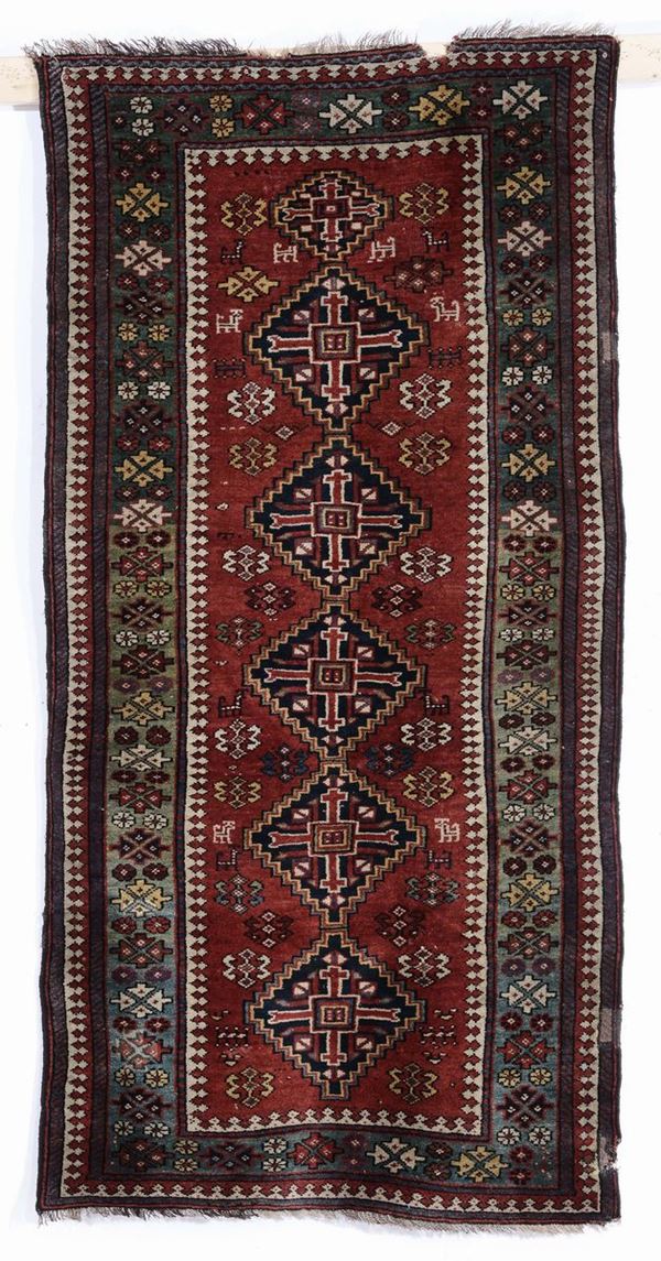 A caucasian long rug, 1900 circa,