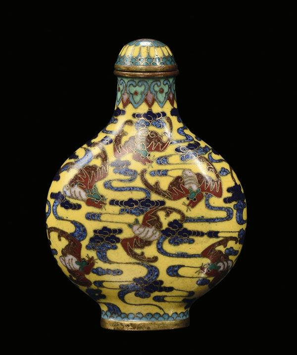 An enamel snuff bottle on yellow background with stylized decoration, China, Qing Dynasty, 19th century