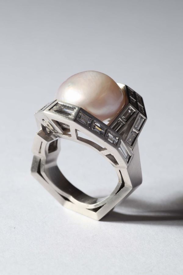 Mississippi scarf by Enrico Cirio, Italy 2005. A baguette diamonds and Mississippi pearl ring. Natural pearl Mississippi weighing ct.23,132. Accompanied by R.A.G laboratory report