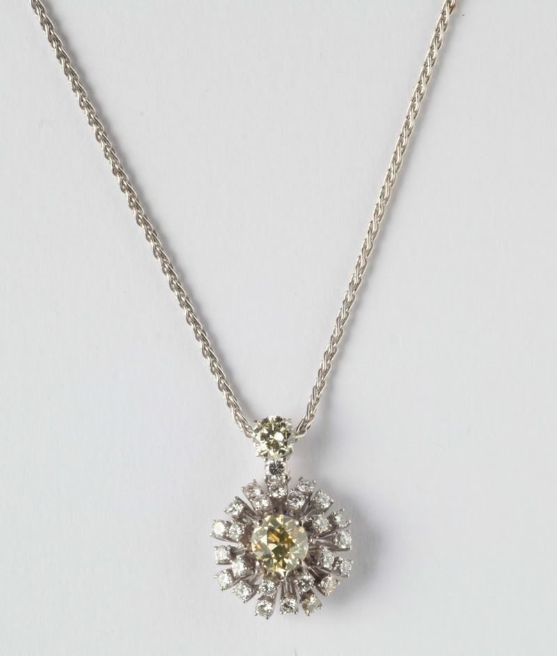 A gold and diamond pendent  - Auction Silver, Watches, Antique and Contemporary Jewelry - Cambi Casa d'Aste
