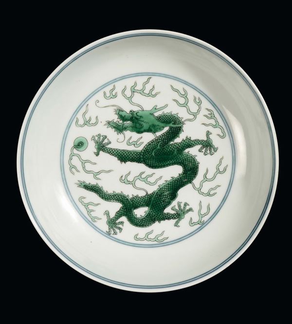 A porcelain green enamel dish with dragon, China, Qing Dynasty, Daoguang (1821-1850) mark and the period