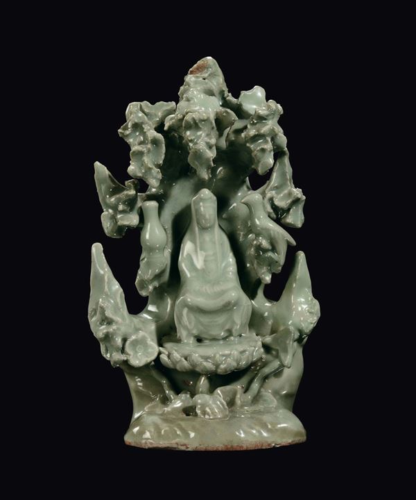 A rare Longquan Celadon porcelain “Guanyin sitting among the rocks” group, China, Ming Dynasty, 16th century