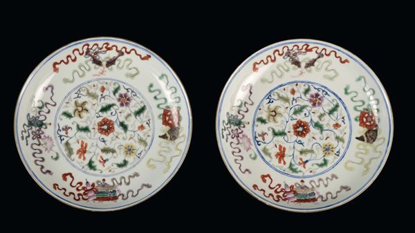 A pair of polychrome porcelain dishes with floral decoration, China, Republic, 20th century