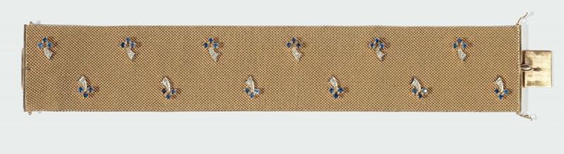 A gold bracelet with floral motif  - Auction Silver, Watches, Antique and Contemporary Jewelry - Cambi Casa d'Aste