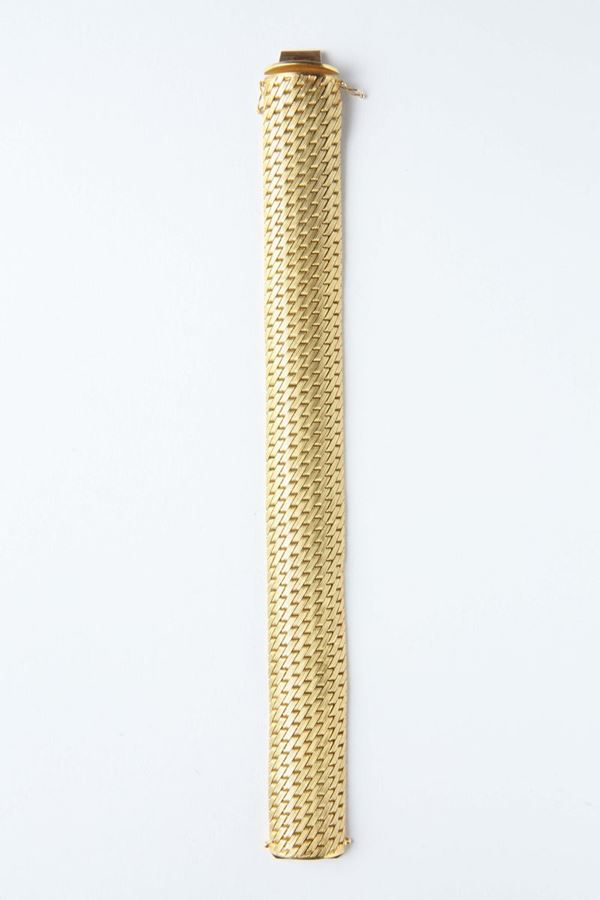A gold bracelet. 1960-70s