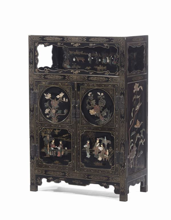 A small lacquered wood piece of furniture decorated with figures and hard stones inserts, China, Qing Dynasty, late 19th century