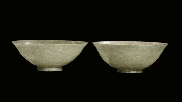 A pair of green Celadon jade bowls, China, Qing Dynasty, Qianlong Period (1736-1795)