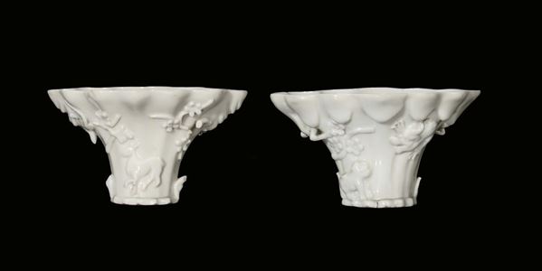 A pair of Blanc de Chine porcelain libation cups, Dehua, China, late 17th century