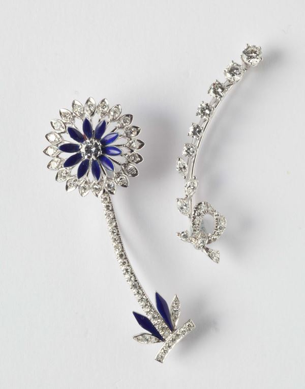 A diamonds and sapphire brooches