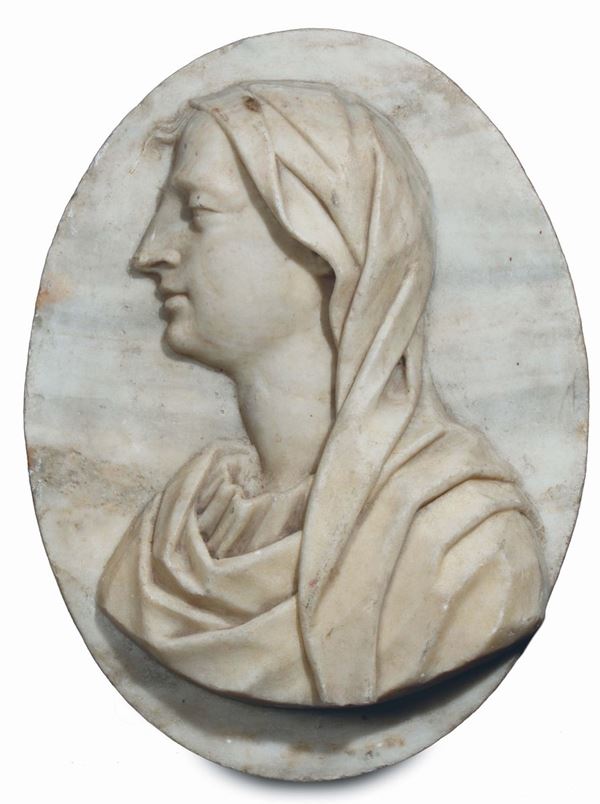 A marble oval with female profile, Italian sculptor of the 18th century