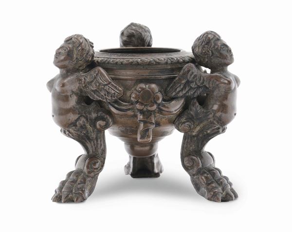 A molten and chiselled bronze tripod inkwell, Italy 19th century