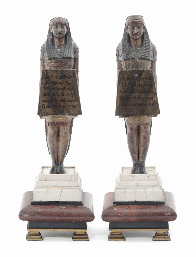 A pair of Egyptian figures in painted wood on marble and ivory bases, Italian or French sculptor of the 19th century  - Auction Sculpture and Works of Art - Cambi Casa d'Aste