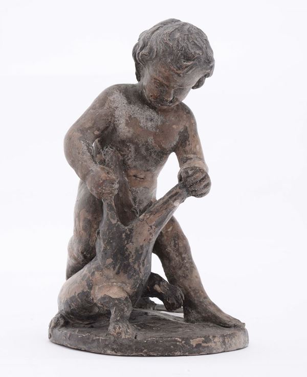 An earthenware sculpture representing a child fighting against a crocodile, plastic artist of the 18th - 19th century