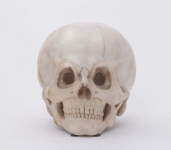 A marble “Memento mori” in the shape of a skull, stone cutter, 19th - 20th century
