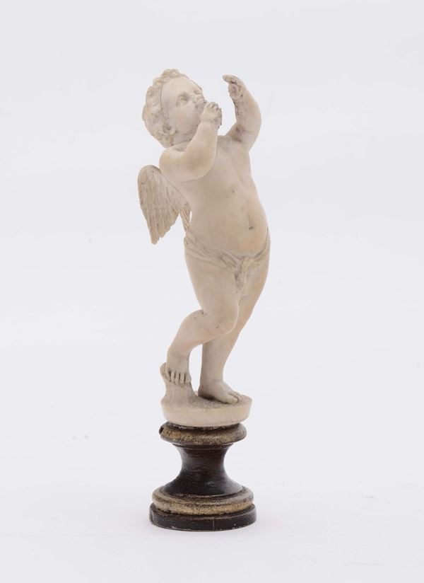 An ivory sculpture representing a winged putto on a polished and ebonized wooden base, German art, 17th century, sculptor in the circle of Marcus Heiden (1618-1660)