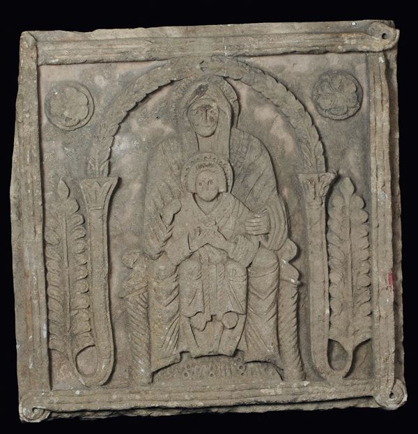 A stone bas-relief representing a Madonna on the throne with Child, Romanic art style, 19th - 20th century