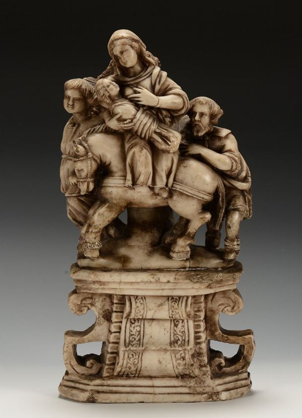 An alabaster Egypt Escape with golden heightening traces, Malines 16th - 17th century