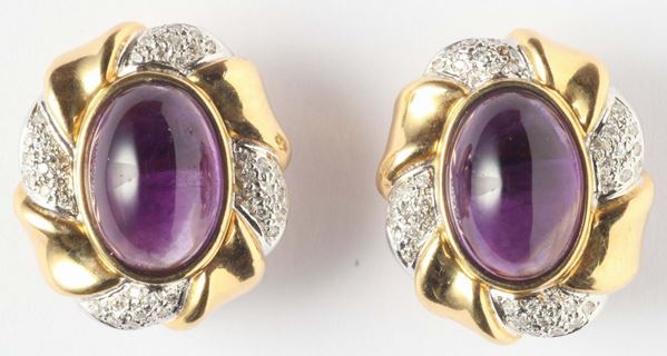 A pair of cabochon amethyst and diamond earring