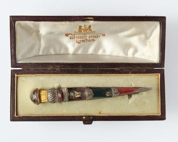 A 20th century Scottish gem-set and silver brooch. Original box