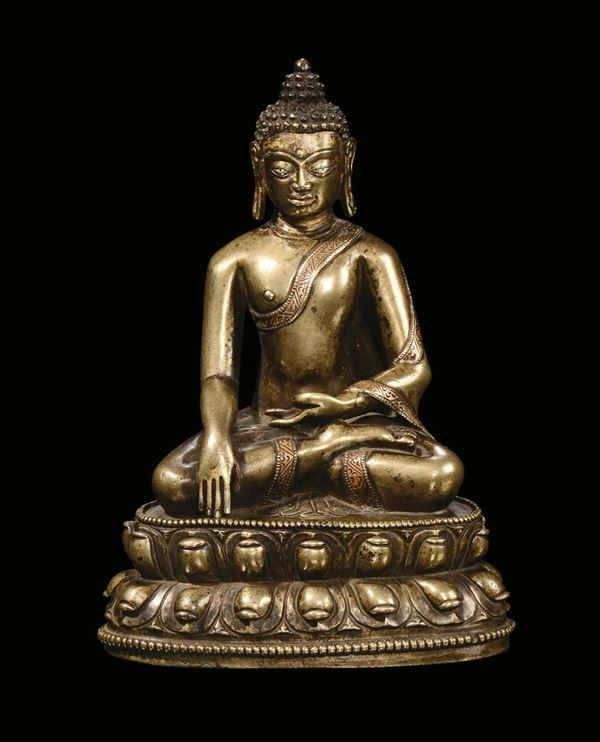 A rare and important bronze Amitaya with silver applications, Tibet, 15th century