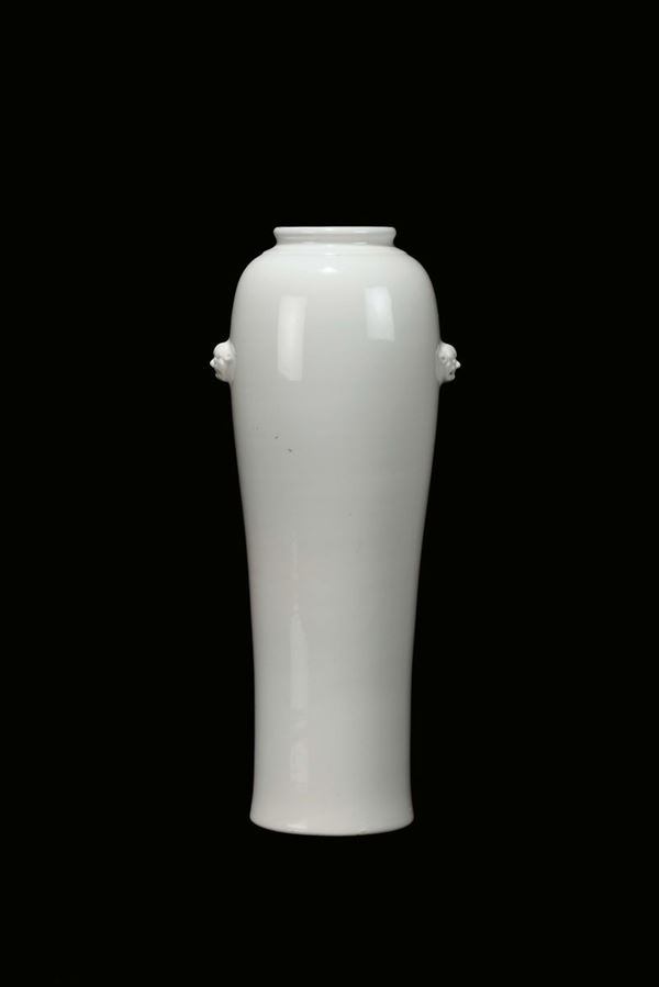 A Blanc de Chine porcelain vase with relief masks, Dehua, China, late 17th century