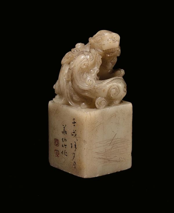 A soapstone square-base seal carved on top with imaginary animal, China, Qing Dynasty, 19th century