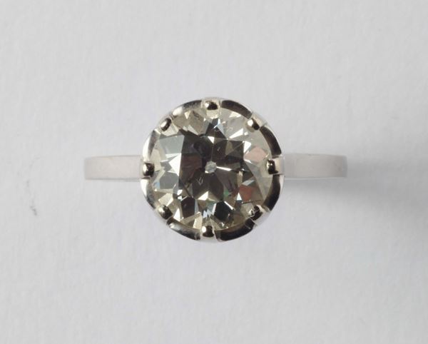 A diamond single-stone. The old-cut diamond weighing ct 3,00 circa