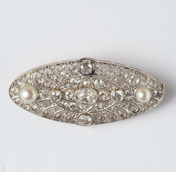A pearl, diamond, platinum and gold brooch