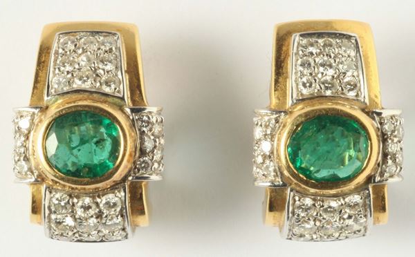 A pair of emerald, diamond and gold earrings