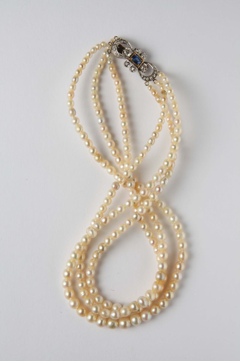 A three-row natural pearl necklace with diamond and sapphire clasp  - Auction Silver, Watches, Antique and Contemporary Jewelry - Cambi Casa d'Aste