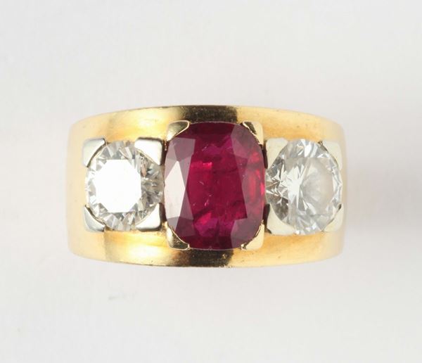 A ruby and diamond ring. The ruby weighing ct 3,00 circa. No indication of heating (NTE)