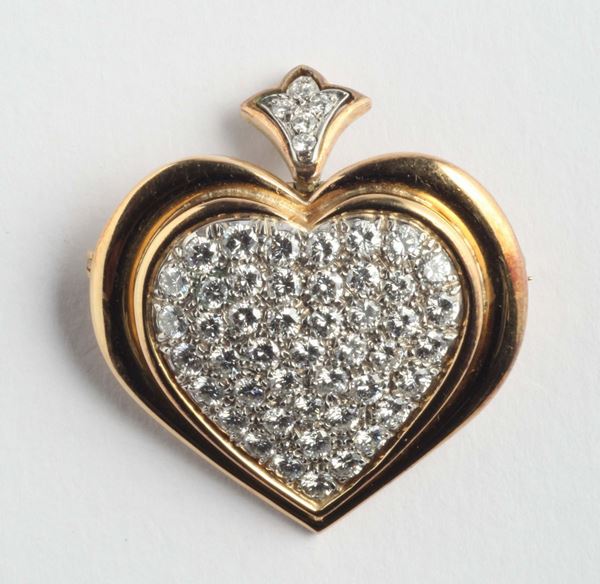 A pavé diamond and gold brooch/pendant