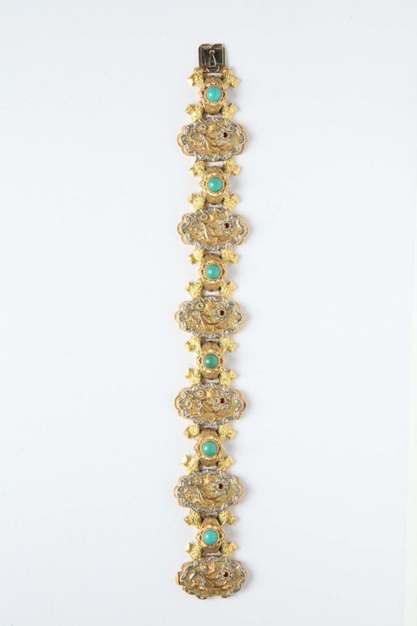 A turquoise and gold bracelet. Signed Cazzaniga, Roma