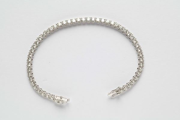 A diamond line bracelet weighing ct 6,00. Accompanied by a I.G.N. report