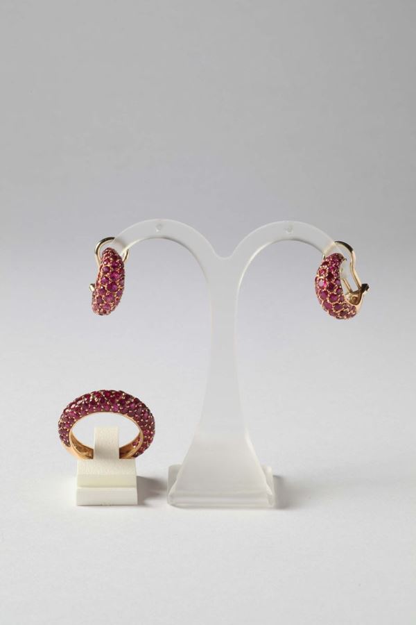 A pair of ruby earrings and ring
