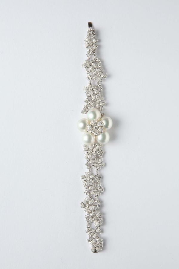 A diamond, cultured freshwater pearls and gold bracelet