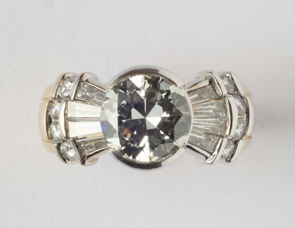 An old-cut diamond ct 3,00 circa and tepper-cut diamond ring
