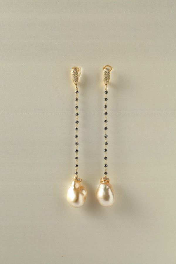 A pair of cultured gold pearl, diamond and sapphire pendant earrings