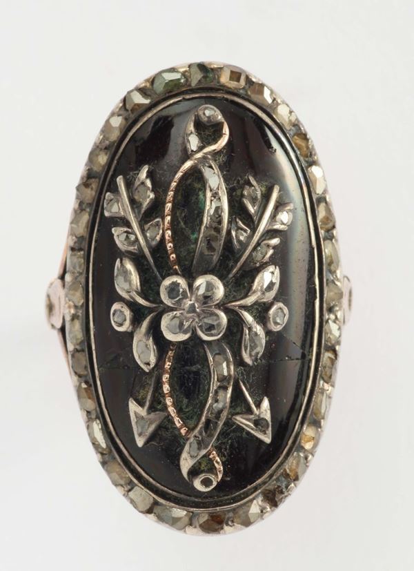 A 19th century enamel, gold and silver ring