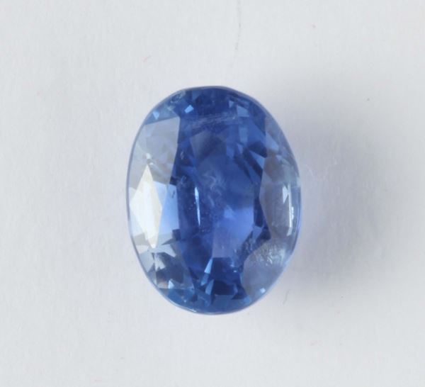 A sapphire accpmpanied by a R.A.G report. Laboratory stating that the saoohire weighing ct 9,64. No indication of heating (NTE)
